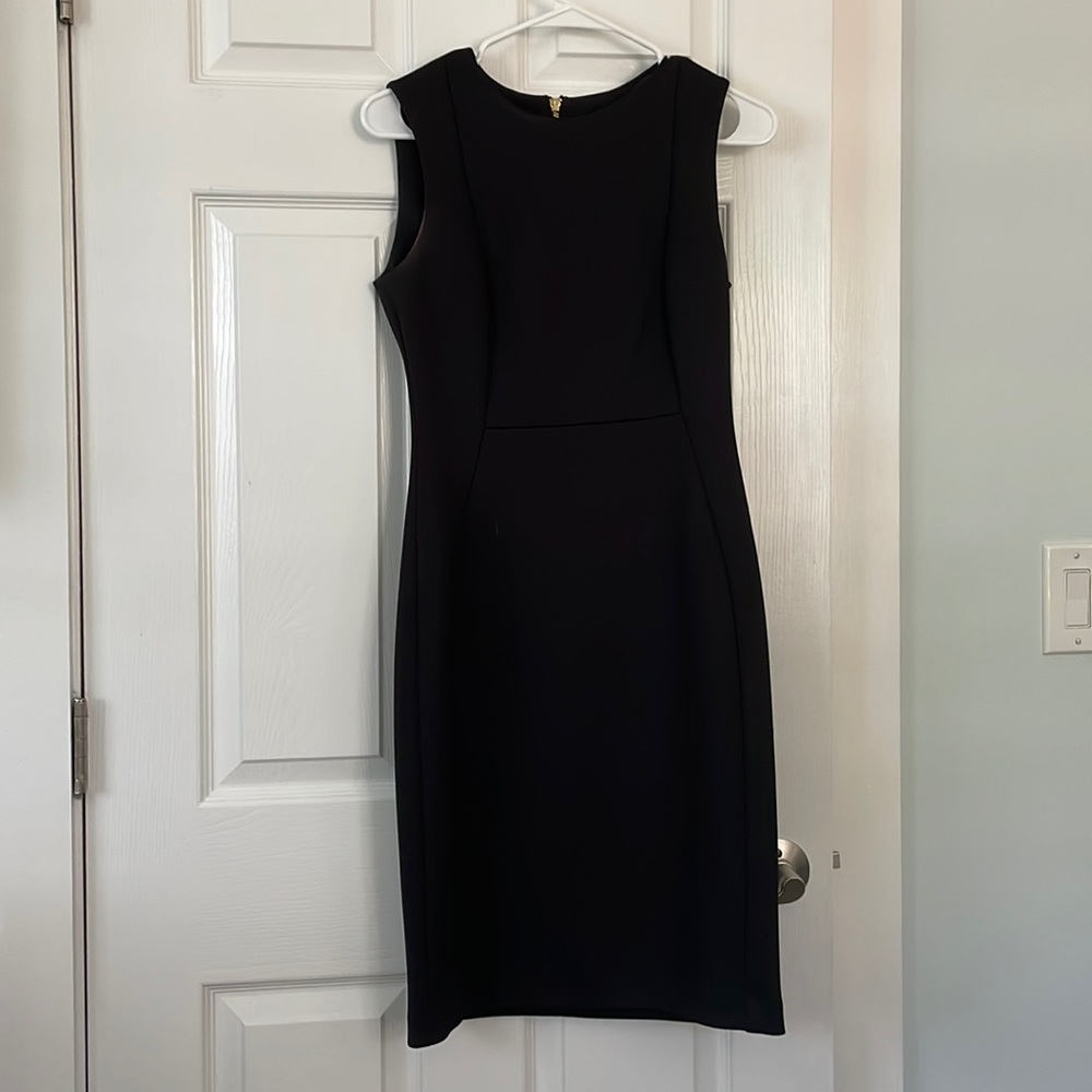 Black form fitting Calvin Klein size 4 dress gently worn.